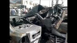CLEAN : Car bomb kills 10 at busy Baghdad intersection: officials News Clip