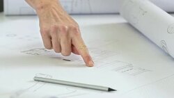 DS CU Engineers Studying Blueprints Stock Footage