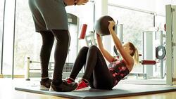 People stretching in exercise class Stock Footage