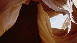 Beautiful unique caves with washed walls sit in the sunlight. Stock Footage