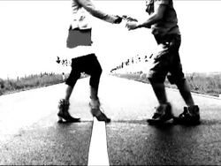 Couple dancing salsa in the road Stock Footage
