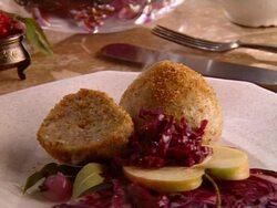 Cooked dumplings and red cabbage on plate Stock Footage