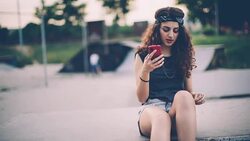Young funky woman enjoying at skate park in sunset Stock Footage