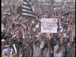 Demonstrators pack sports stadium for anti-US rally. News Clip