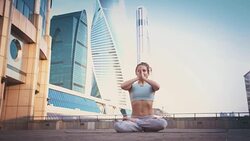 Young Woman Doing Yoga Meditation Exercises at Sunset Stock Footage