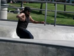 WS SLO MO TS Shot of guy skates around park and fails rail grind / Venice, California, United States Stock Footage