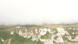 Aerials over Dover harbour and white cliffs News Clip
