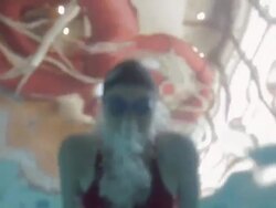 TU Swimmer doing the breaststroke in a pool / Vancouver, British Columbia, Canada Stock Footage