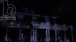 Static shot of a manor house by night, 1930s Stock Footage
