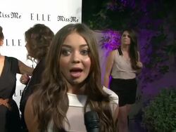 INTERVIEW: Sarah Hyland on her dress at Elle Magazine And Sarah Hyland Hosts Songbirds' Miss Me Album Release Party Stock Footage