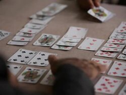 Old man playing cards. Stock Footage