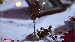 Orthodox cross prepared for christening ceremony Stock Footage