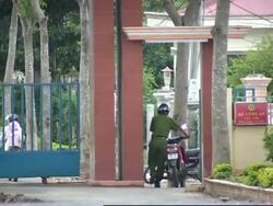 UPDATE Disgraced singer boards flight to Bangkok, plane, security News Clip