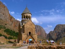 MS PAN Tourist walking in front of noravank monastery / Armenia Stock Footage