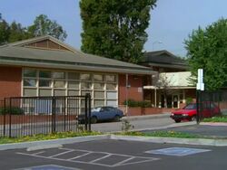 WS View of brick buildings with many small windows park recreational elementary school / California, United States Stock Footage