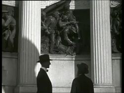 B/W 2 men looking at Iowa Monument / Vicksburg, Mississippi / NO SOUND Stock Footage
