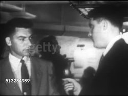 1952: ROUTE CONTROL CENTER: CAA radar expert James Richey w/ LIFE Military correspondent Clay Blair Jr. SOT saying he hasn't talked to Sanford, however, they're going to try to explain it, Blair saying military says light refraction. Instructional Video