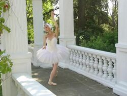 dancing ballerina beautiful park alley Stock Footage