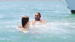 Happy couple swimming Stock Footage