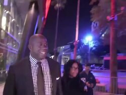Magic Johnson & Cookie Kelly Johnson at Staples Center in Los Angeles, 01/04/13 Stock Footage