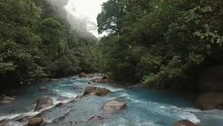 AERIAL Beautiful turquoise river Rio Celeste Stock Footage