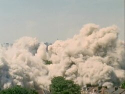WA high speed demolition of two tower blocks, Hackney, area of regeneration for the Olympics 2012 London, UK Stock Footage