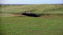 Ladies in car driving through countryside, 1908 - reenactment Stock Footage