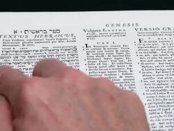 HD Reading Genesis 1:26-27 (Rack Focus) (4:2:2) Stock Footage