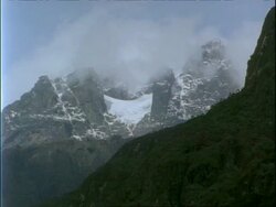 WA Snowy mountains shrouded in fog, Rwenzori Mountains, Uganda Stock Footage