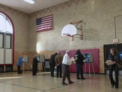 November 2, 2010 WS A voter waiting in line to complete his ballot in a gymnasium / Dearborn, Michigan, United States Stock Footage
