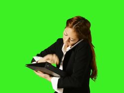 Beautiful Business Woman Talking Telephone And Taking A Note Stock Footage