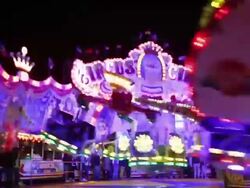 MS Shot of People enjoying amusement ride at funfair, flying bobs / Cologne, Germany Stock Footage