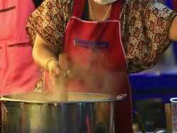 Woman cooking noodle Stock Footage