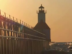 Sunset Lighthouse with Surf Stock Footage