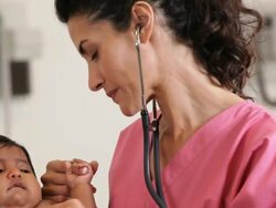 "CU medical worker checking the heart of an infant hispanic patient/Richmond,Virginia, USA " Stock Footage