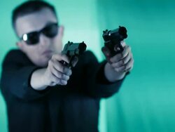 man holding two pistols Stock Footage