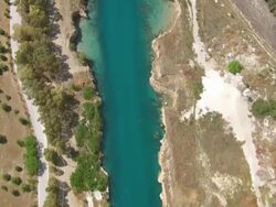 MS AERIAL TS Shot of corinth canal with houses / Corinth, Peloponnese, Greece Stock Footage
