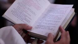 Man holding holy bible Stock Footage