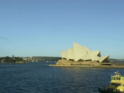 Ferry Boats passing the Sydney Opera House, Sydney, New South Wales, Australia Stock Footage