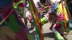 VOICED : Los diablos salen a las calles de Naiguata News Clip