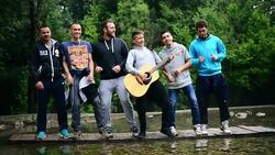 Man playing his guitar with friends. Stock Footage