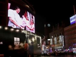 MS Blinking billboards at night in city / Beijing, China Stock Footage