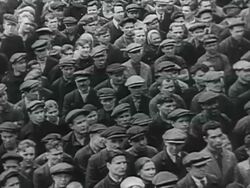 MS PAN Large crowds of civilians listening to Stalin's public address through loudspeakers announcing Russia at war AUDIO / Russia Stock Footage