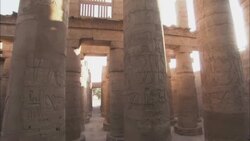 The sun illuminates the interior of an ancient temple in Karnak, Egypt. Stock Footage