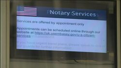 US Embassy with passport information screens News Clip