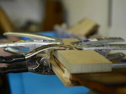 Craftsman 'Luthier' Nigel Forster making hand made Guitars Stock Footage
