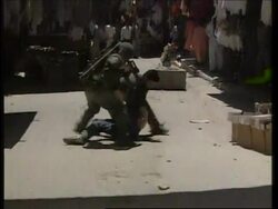 MIDDLE EAST: UNDERCOVER ISRAELI TROOPS INFILTRATE PALESTINIAN RIOTERS News Clip