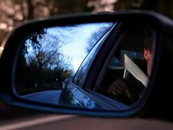 Driving Reflected in Side Mirror HD Stock Footage