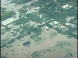 Haity city cut off by flood water, Bahama preps, graphic News Clip