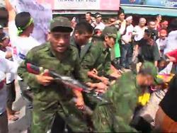 Tibetan exiles dress as Chinese soldiers in pro-Tibet demo Instructional Video